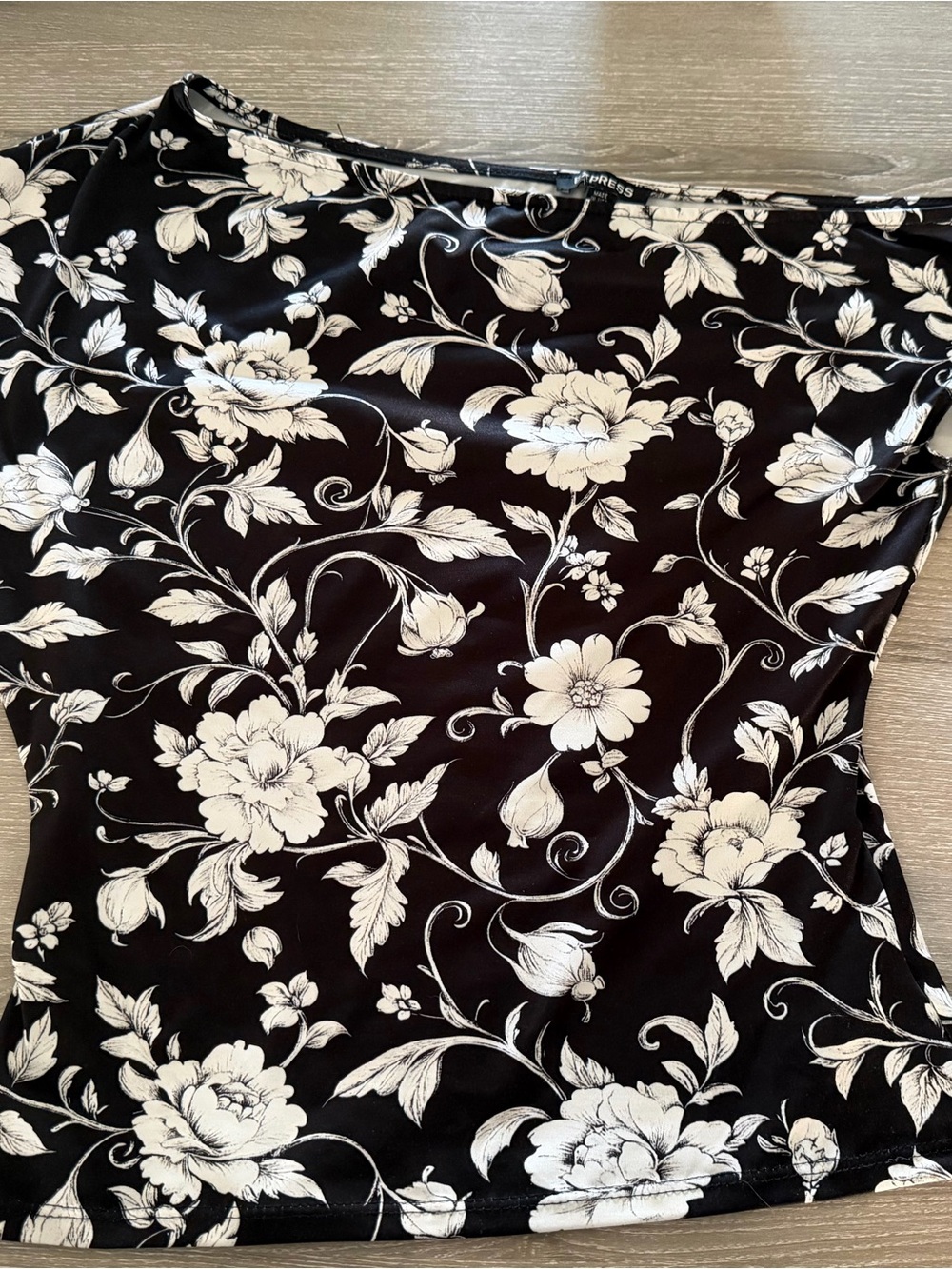 Express Asymmetrical Black Top with White Floral Pattern